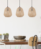 Trenza lámpara colgante triple sobre mesa de comedor