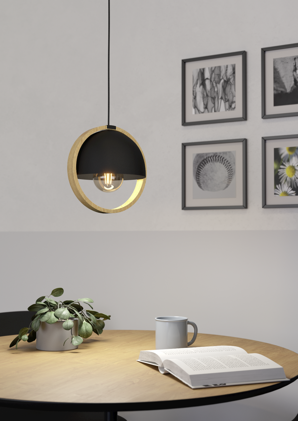 Lámpara colgante Luna instalada sobre mesa de comedor
